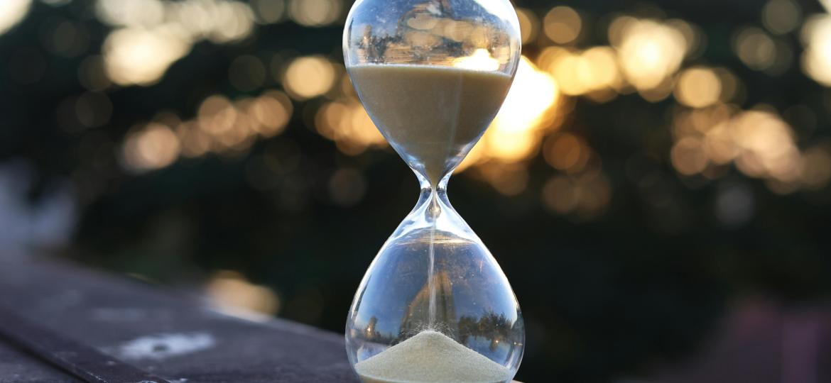 An hourglass on a table