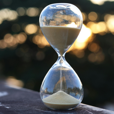 An hourglass on a table