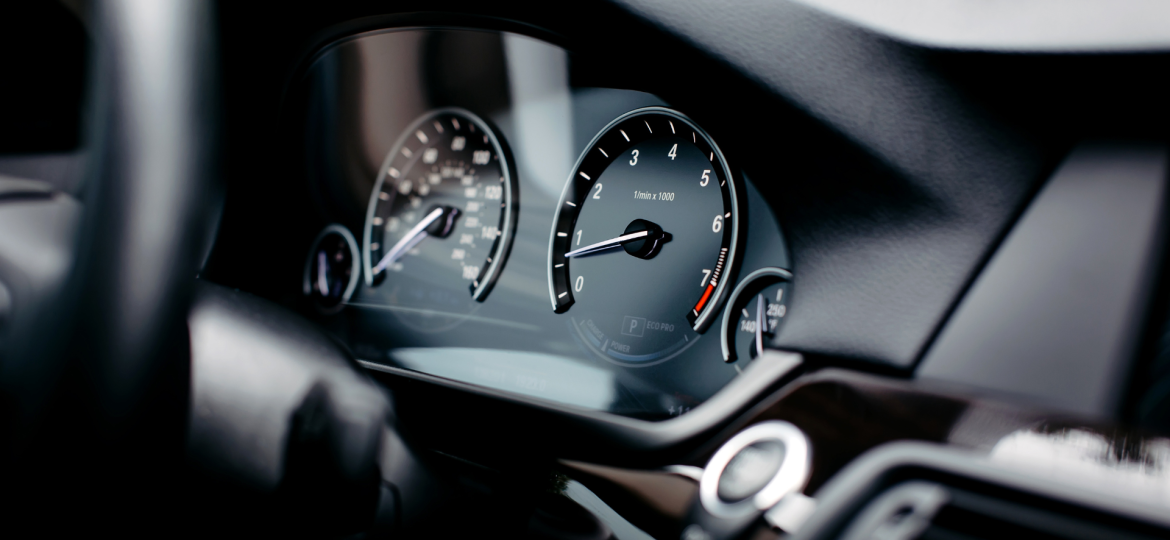 The black dashboard of a car