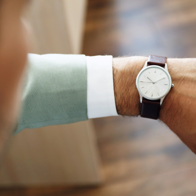 A watch on a man's left wrist
